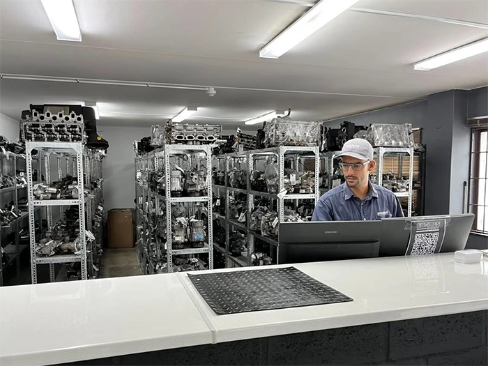 Interior view of the Engines Direct store showing the part collection desk